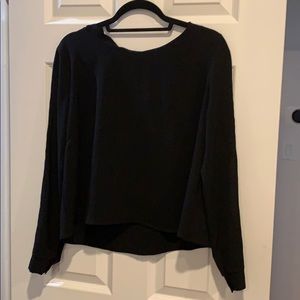 Black top with fun detail on sleeve